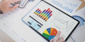 Person presenting benefits of a KPI dashboard for CargoWise users, highlighting key performance metrics and improvements.